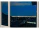 Enjoy amazing views of the Las Vegas skyline through the window of this home at 10729 Marathon Bell Ln, Las Vegas, NV 89129