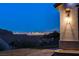 Striking Las Vegas skyline views from this home's front exterior, offering an inviting entryway and stunning surroundings at 10729 Marathon Bell Ln, Las Vegas, NV 89129