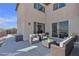Spacious outdoor patio area ideal for relaxation and entertainment with comfortable seating at 10729 Marathon Bell Ln, Las Vegas, NV 89129