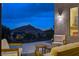 Relaxing outdoor patio area with comfortable seating and stunning views of the surrounding landscape at 10729 Marathon Bell Ln, Las Vegas, NV 89129