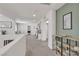 Open upstairs landing offers space for work and relaxing with neutral walls and plenty of natural light at 10729 Marathon Bell Ln, Las Vegas, NV 89129
