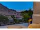 Beautiful view of the Las Vegas skyline and surrounding mountains from the home's outdoor space at 10729 Marathon Bell Ln, Las Vegas, NV 89129