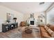 Inviting living room features a fireplace, hardwood floors, and comfortable seating for relaxation at 11707 Longworth Rd, Las Vegas, NV 89135