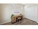 Clean office with modern desk, stylish chair, neutral decor, and plenty of natural light at 11707 Longworth Rd, Las Vegas, NV 89135