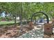 Community playground area with mature trees and shaded seating, creating a comfortable environment at 11707 Longworth Rd, Las Vegas, NV 89135