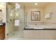 Bathroom boasts a walk-in shower and soaking tub at 125 E Harmon Ave # 717, Las Vegas, NV 89109
