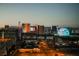 The Las Vegas skyline features the High Roller, Venetian, and a glowing MSG Sphere at dusk at 125 E Harmon Ave # 717, Las Vegas, NV 89109