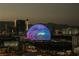 Bustling Vegas skyline view showcasing The Sphere lit up with a swirling design at 125 E Harmon Ave # 717, Las Vegas, NV 89109