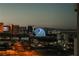 Bright lights illuminate the city skyline with vibrant displays on the MSG Sphere and surrounding buildings at dusk at 125 E Harmon Ave # 717, Las Vegas, NV 89109