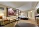 Spacious open-concept living area with a well-lit interior, neutral color scheme and comfortable seating at 125 E Harmon Ave # 717, Las Vegas, NV 89109