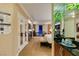 Hotel suite featuring a full wet bar, comfortable seating area, and an open bedroom area at 125 E Harmon Ave # 717, Las Vegas, NV 89109
