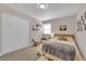 Bright bedroom offers carpet, natural light, and ample closet space, providing comfort and convenience at 1320 Wengert Ave, Las Vegas, NV 89104