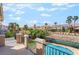 Balcony offering views of the pool, landscaping, and community homes at 1553 Ravanusa Dr, Henderson, NV 89052