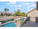 Balcony with views of pool, landscaping, and neighboring houses at 1553 Ravanusa Dr, Henderson, NV 89052