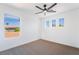 Neutral bedroom with large window for natural light at 1553 Ravanusa Dr, Henderson, NV 89052
