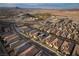 Scenic aerial view of a community with mountain and lake views at 174 Cabo Cruces Dr, Henderson, NV 89011