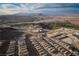 Breathtaking aerial view of the community near the lake and mountains at 174 Cabo Cruces Dr, Henderson, NV 89011