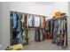 Walk-in closet with rods and shelving for clothing storage, providing ample space and organization at 174 Cabo Cruces Dr, Henderson, NV 89011