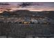 Beautiful hillside neighborhood with stunning sunset views and desert landscaping at 174 Cabo Cruces Dr, Henderson, NV 89011