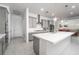 Modern kitchen with gray cabinetry, stainless appliances, and a large island at 174 Cabo Cruces Dr, Henderson, NV 89011
