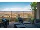 Relaxing patio with comfortable seating and panoramic views of the surrounding landscape, a peaceful outdoor retreat at 174 Cabo Cruces Dr, Henderson, NV 89011