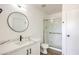 Bathroom with white countertops, and glass enclosed shower at 2110 Los Feliz St # 1003, Las Vegas, NV 89156