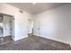 Bedroom with multiple doors, neutral carpet, and white walls at 2110 Los Feliz St # 1003, Las Vegas, NV 89156