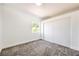 Bright bedroom featuring plush carpeting and a closet with sliding doors at 2110 Los Feliz St # 1003, Las Vegas, NV 89156