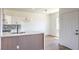 Modern kitchen featuring an island, stainless steel appliances, and sleek white cabinetry at 2110 Los Feliz St # 1003, Las Vegas, NV 89156