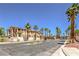 Apartment complex with palm tree-lined street and well-maintained landscaping at 2110 Los Feliz St # 1003, Las Vegas, NV 89156