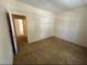 Neutral carpeted bedroom with large closet space, offering comfortable living with ample natural light at 2224 Waterton Rivers Dr, Henderson, NV 89044