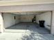 Spacious two-car garage with concrete flooring and ample storage space for vehicles and belongings at 2224 Waterton Rivers Dr, Henderson, NV 89044