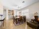 Open dining area with stylish table set and easy access to kitchen at 2558 Divine Sky Dr, Henderson, NV 89044