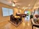 Open concept dining area with lots of natural light and view of the living space at 2558 Divine Sky Dr, Henderson, NV 89044