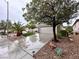 Beautiful single-story home boasting mature landscaping and a well-maintained lawn at 2558 Divine Sky Dr, Henderson, NV 89044