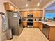 Functional kitchen featuring stainless steel appliances and ample cabinet space at 2558 Divine Sky Dr, Henderson, NV 89044