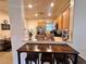 Cozy breakfast nook offering a view of the modern kitchen with stainless steel appliances at 2558 Divine Sky Dr, Henderson, NV 89044