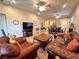 Comfortable living room featuring tile floors, ample seating, and an open floor plan at 2558 Divine Sky Dr, Henderson, NV 89044