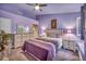 Bedroom showcasing a queen bed, dresser, nightstands, and ceiling fan at 2725 S Nellis Blvd # 2052, Las Vegas, NV 89121