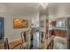 Cozy dining area with decorative lighting and views into the adjacent living room and kitchen at 2725 S Nellis Blvd # 2052, Las Vegas, NV 89121