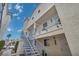 Attractive, multi-story building with blue railings on the stairways and balconies at 2725 S Nellis Blvd # 2052, Las Vegas, NV 89121