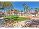 Community grounds with seating areas, green space, and shade trees at 2725 S Nellis Blvd # 2052, Las Vegas, NV 89121