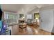 Living room with wood floors, modern furniture, and sliding glass doors at 2725 S Nellis Blvd # 2052, Las Vegas, NV 89121