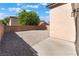 Exterior image with a gravel side yard and partial patio space at 2833 Swanson Ave, North Las Vegas, NV 89086