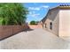 Gravel backyard with tall brick walls surrounding the perimeter at 2833 Swanson Ave, North Las Vegas, NV 89086