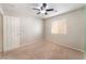 Bedroom featuring neutral walls, carpet, and a window with natural light at 2833 Swanson Ave, North Las Vegas, NV 89086