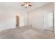 Bedroom featuring vaulted ceilings, carpet floors and walk in closet at 2833 Swanson Ave, North Las Vegas, NV 89086