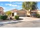 Charming single-story home featuring a two-car garage and well-manicured landscaping at 2833 Swanson Ave, North Las Vegas, NV 89086