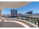 Enjoy city views from this condo balcony with glass railings and neutral tile flooring at 2857 Paradise Rd # 802, Las Vegas, NV 89109