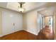 Inviting entryway with wood flooring, leading to a hallway with recessed lighting at 2857 Paradise Rd # 802, Las Vegas, NV 89109